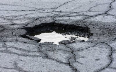 Sinking Driveways: How Failing Catch Basins Create Dangerous Pavement Sinkholes